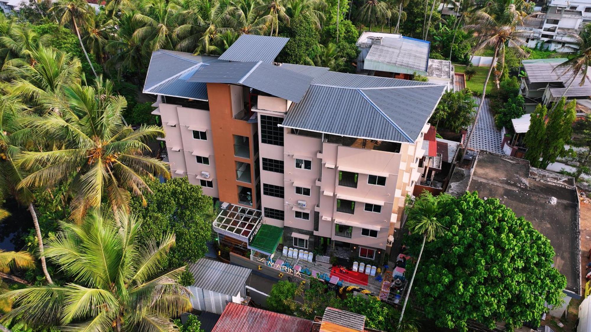 Hotel Le Marina Residency 科泽科德 外观 照片